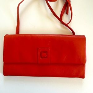 Orange Delsey travel wallet